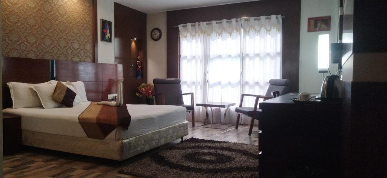 Hotel Ambassador Chocolate Inn Kalyani Bagian luar foto