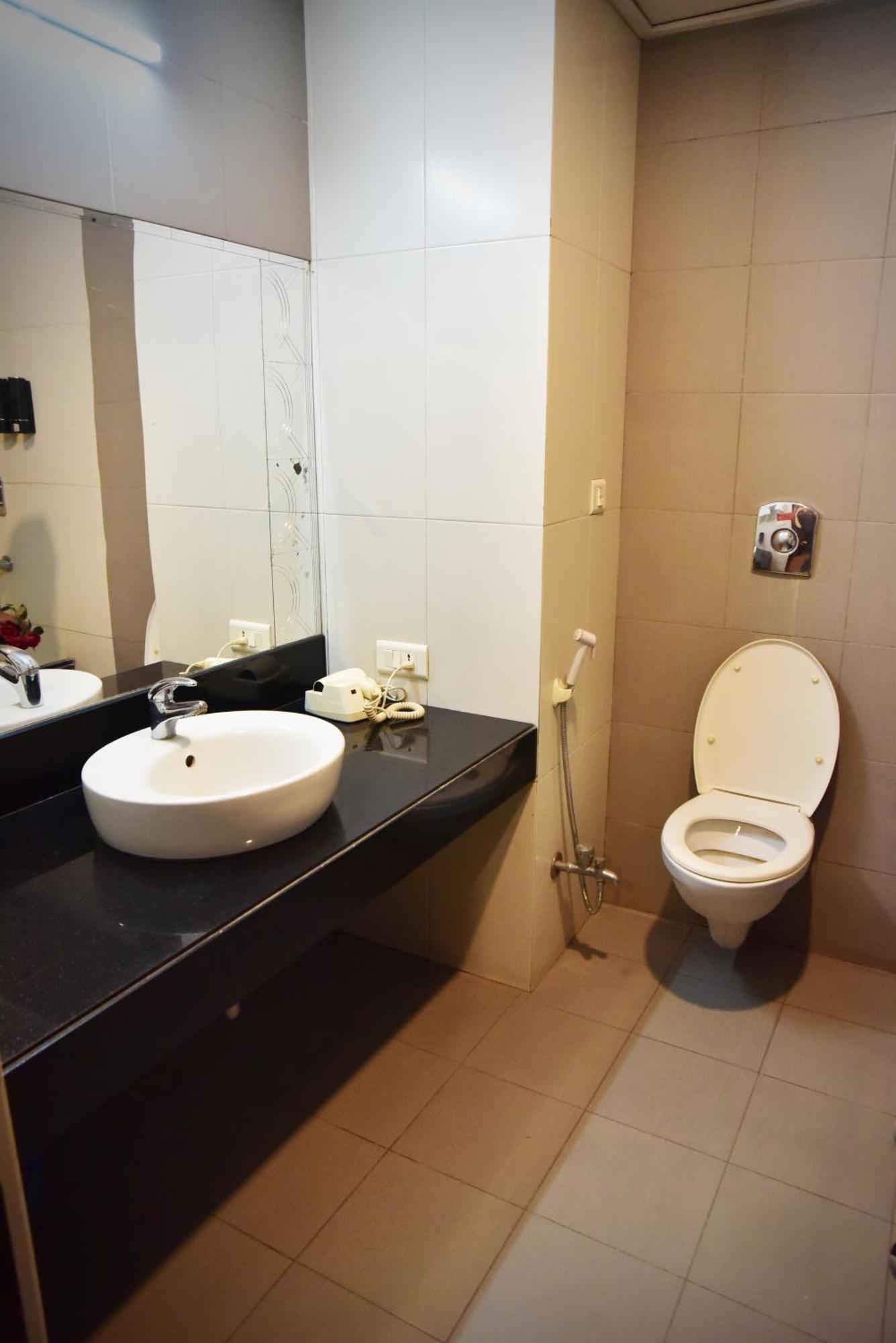 Hotel Ambassador Chocolate Inn Kalyani Bagian luar foto