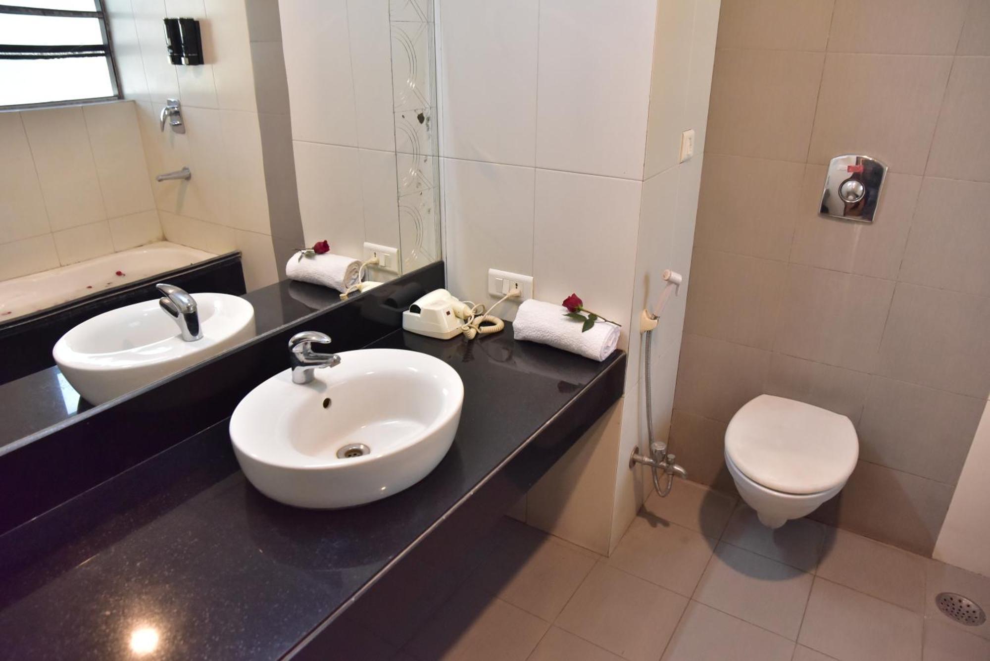 Hotel Ambassador Chocolate Inn Kalyani Bagian luar foto